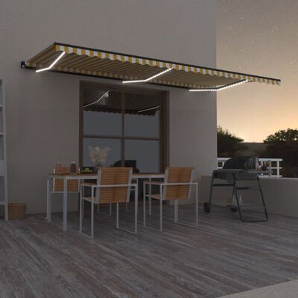 Manuell uttrekkbar markise med LED 600x350 cm gul og hvit